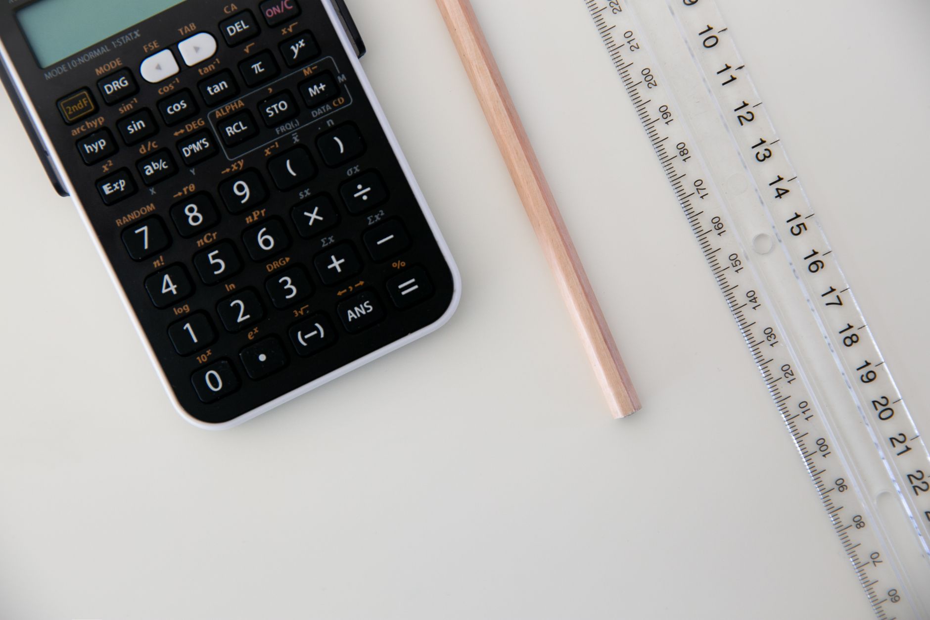 calculator beside equipment quotation