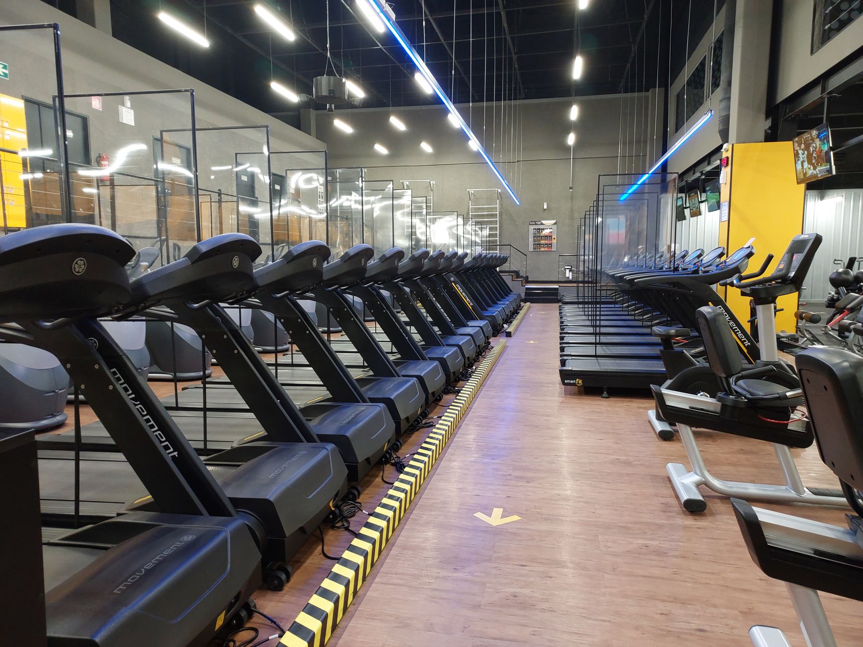 two gym machines side by side two gym machines side by side