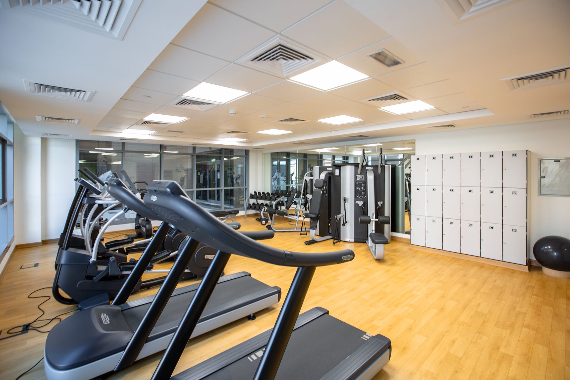 fitness manager reviewing gym floor plan